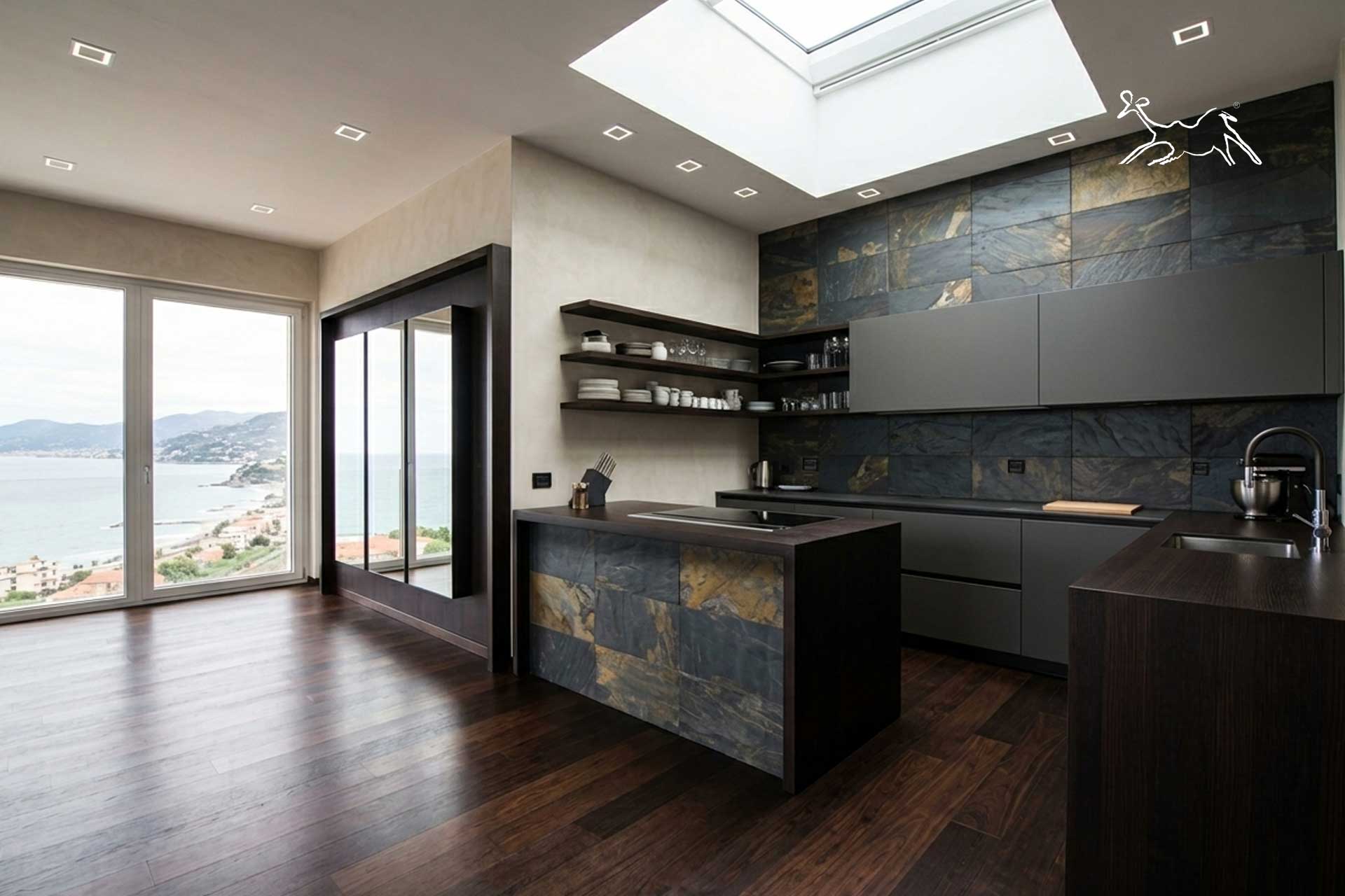 posa piastrelle in ardesia nera e gialla Magma in cucina a arma di taggia